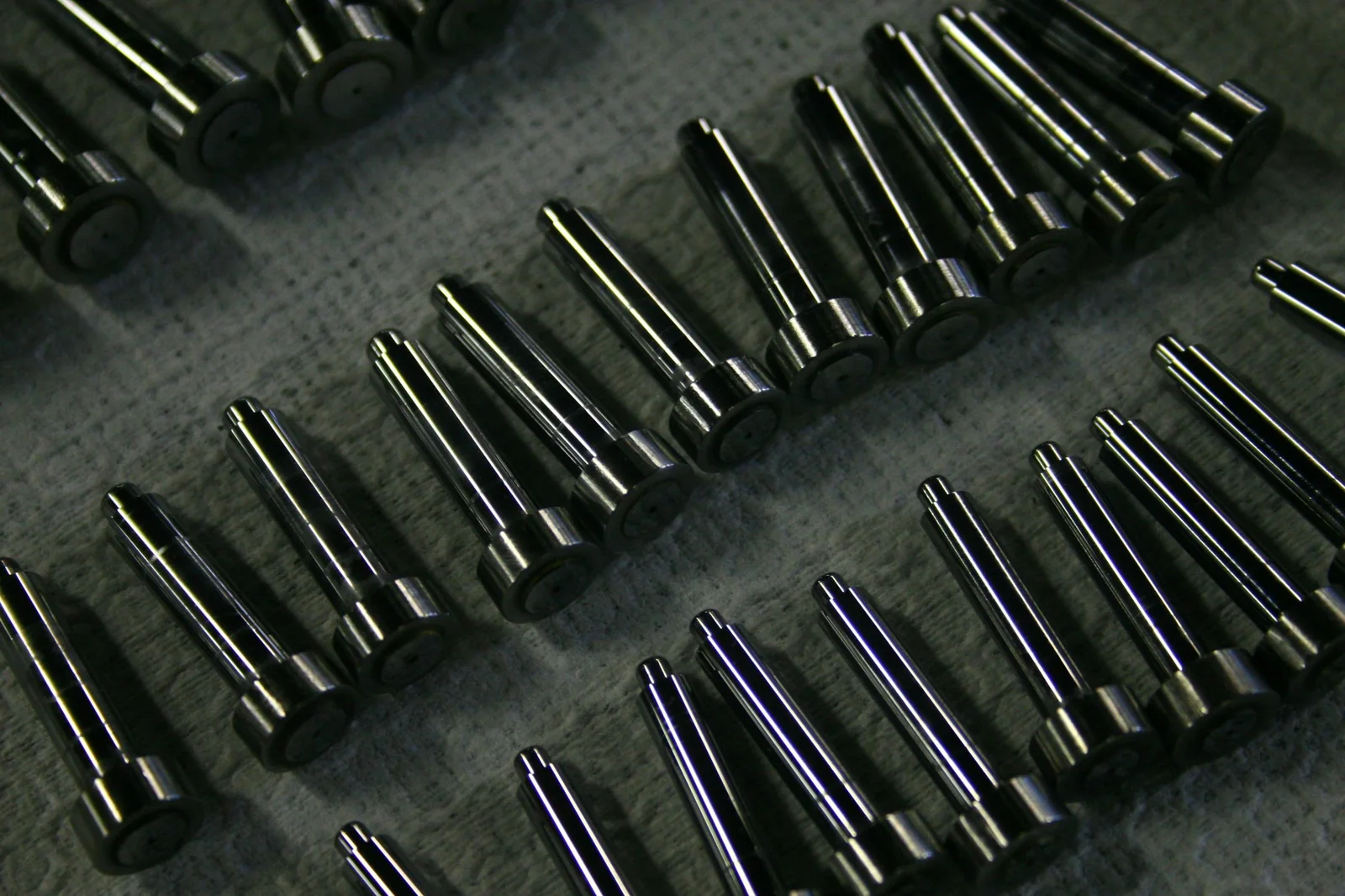 Close-up of precision-machined metal components, illustrative engineering photography